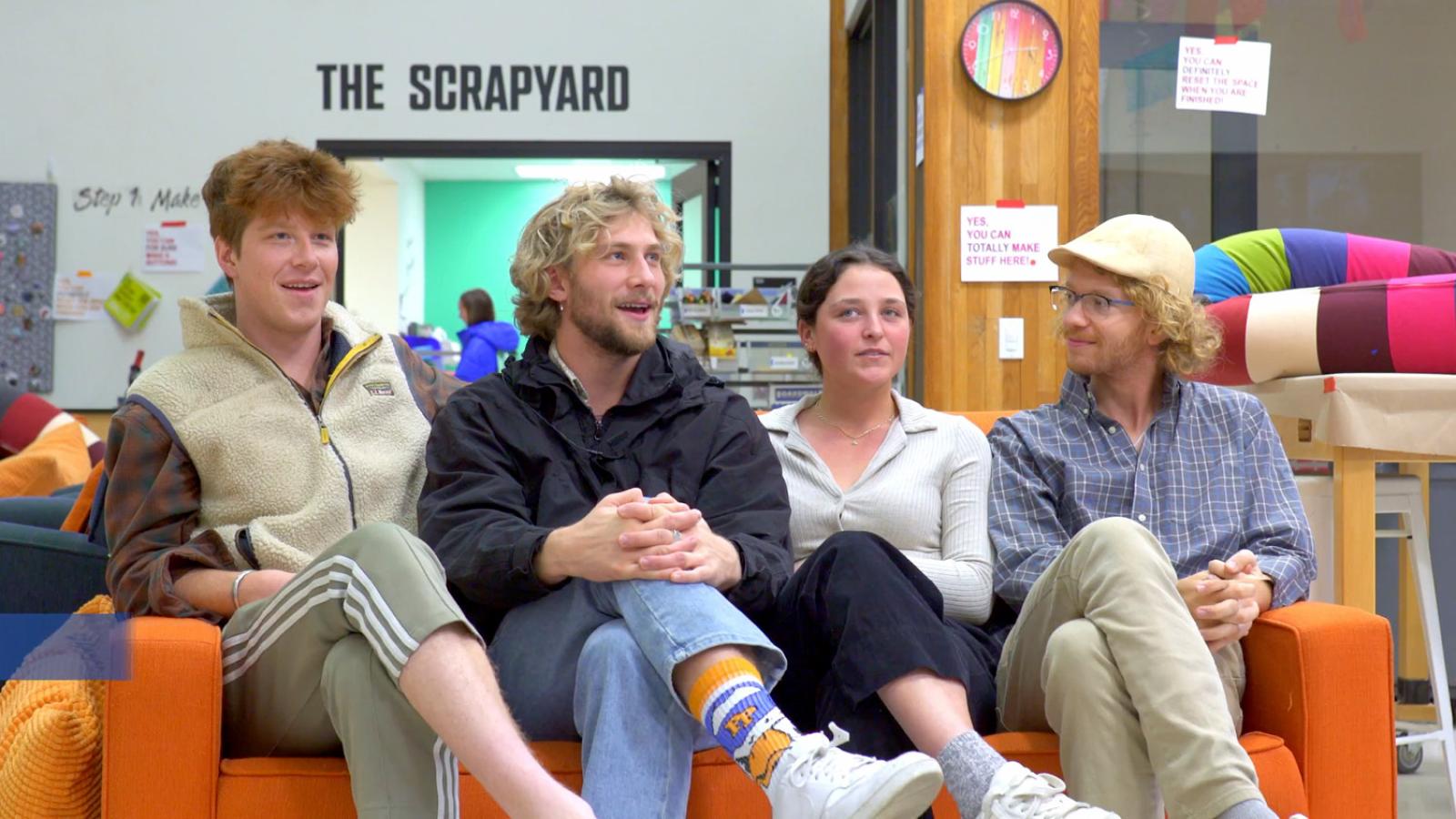 Four students from HCD class sit on a sofa at The Hive