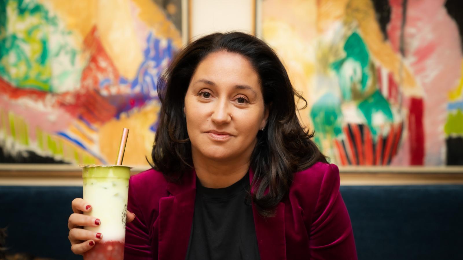 Prof. Kyla Wazana Tompkins holds a boba drink