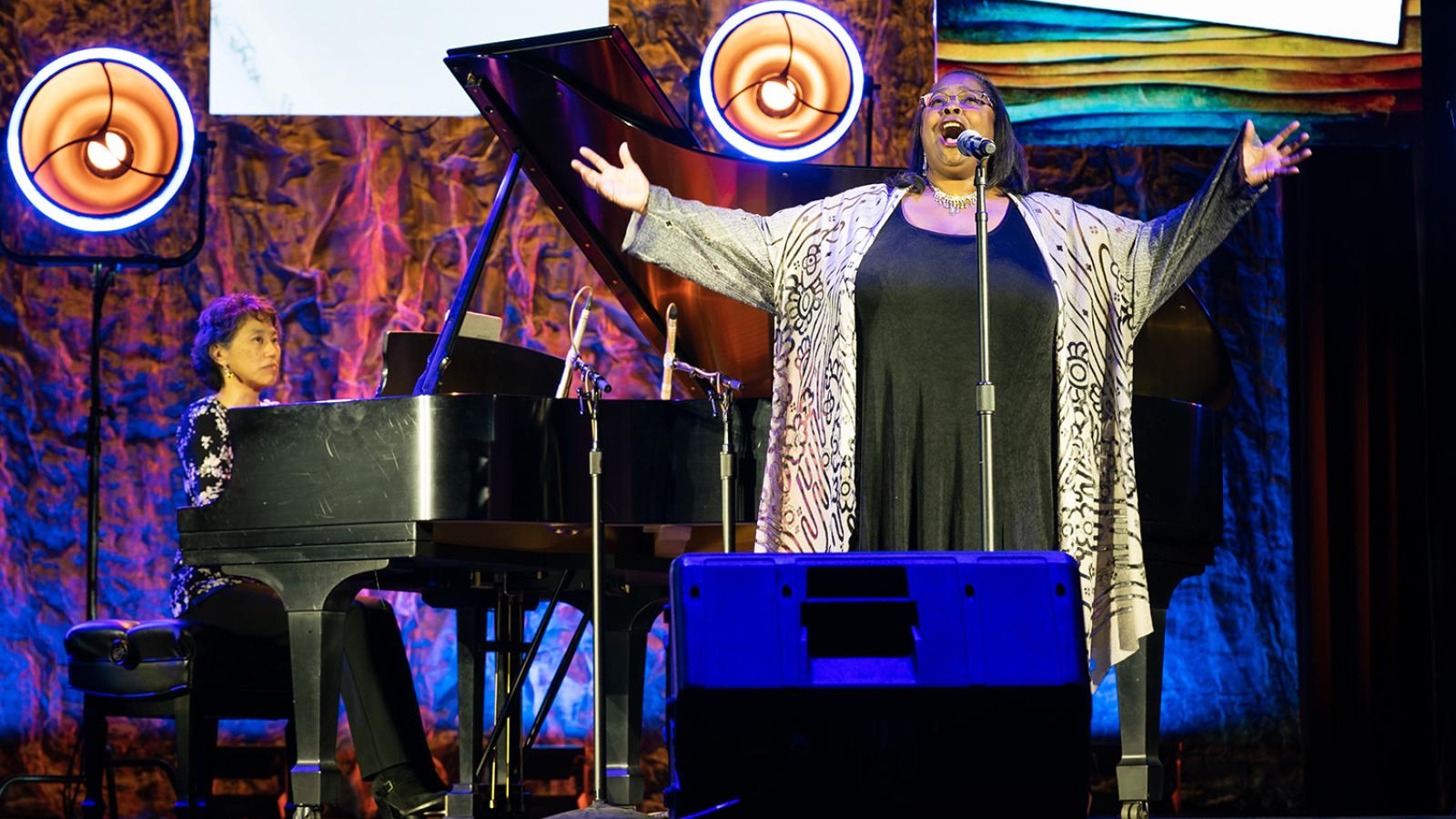 Professors Genevieve Lee and Melissa Givens perform at Big Bridges in March 2023.