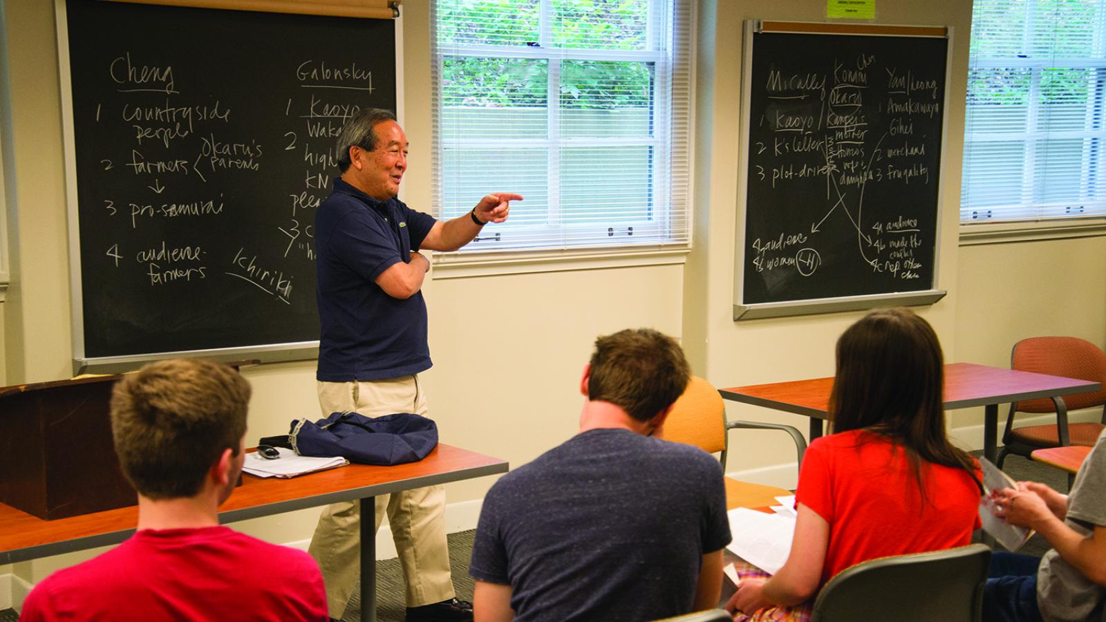 Professor Sam Yamashita in the classroom with students