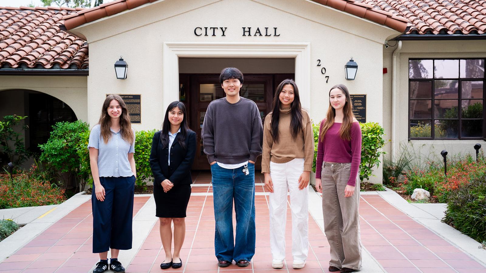 Five Pomona College interns standing outside in front of Claremont City Hall