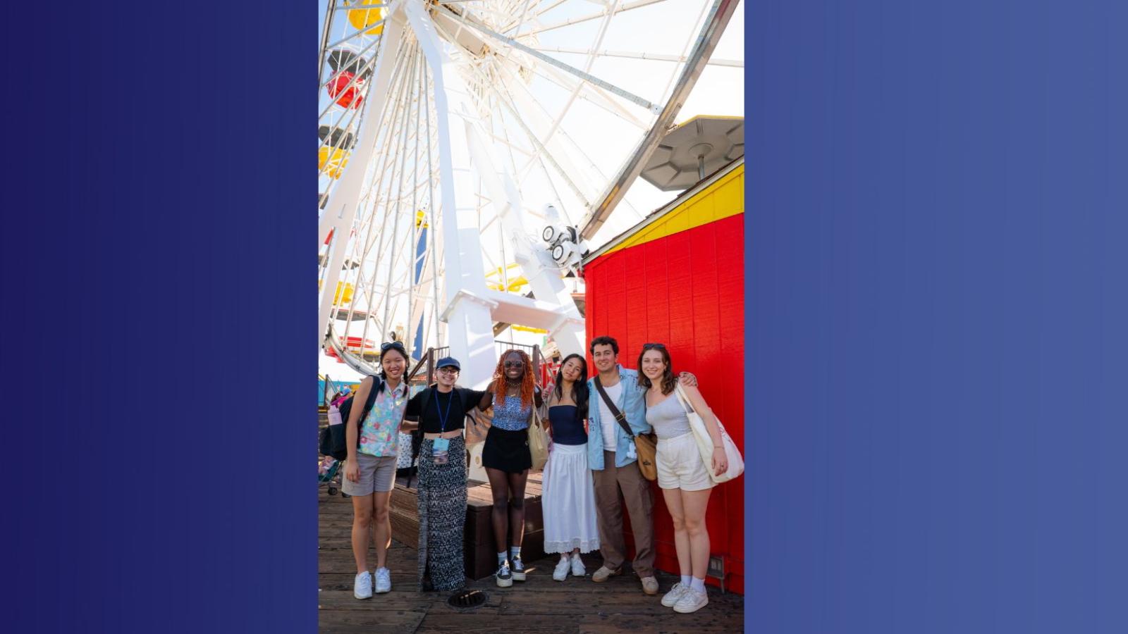 Group of students at base of ferris wheel