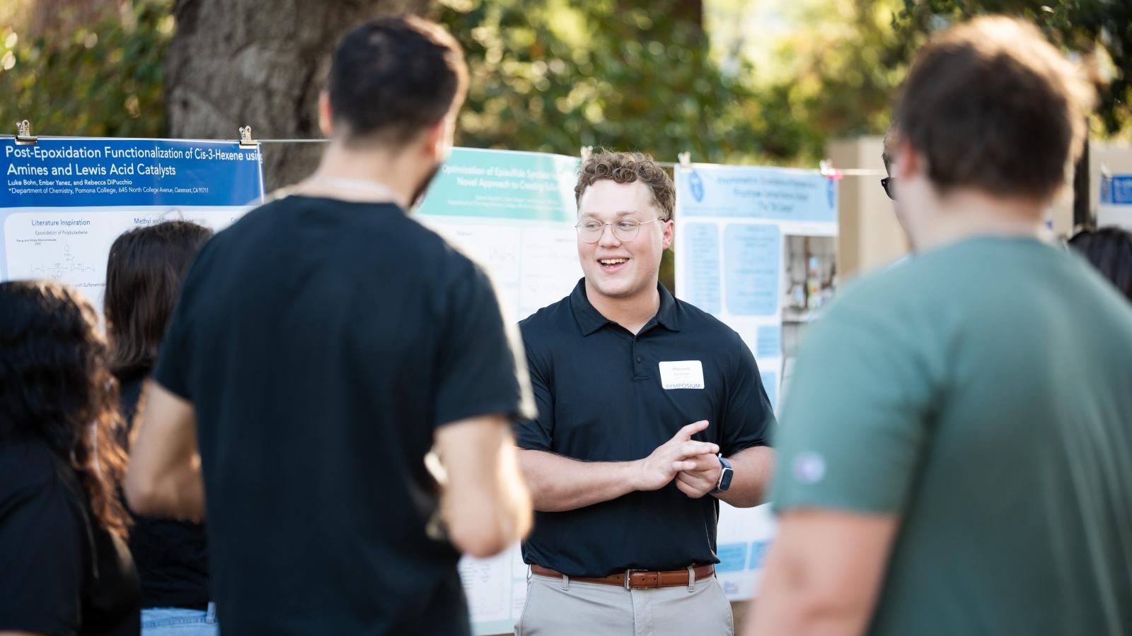 A student speaks to others