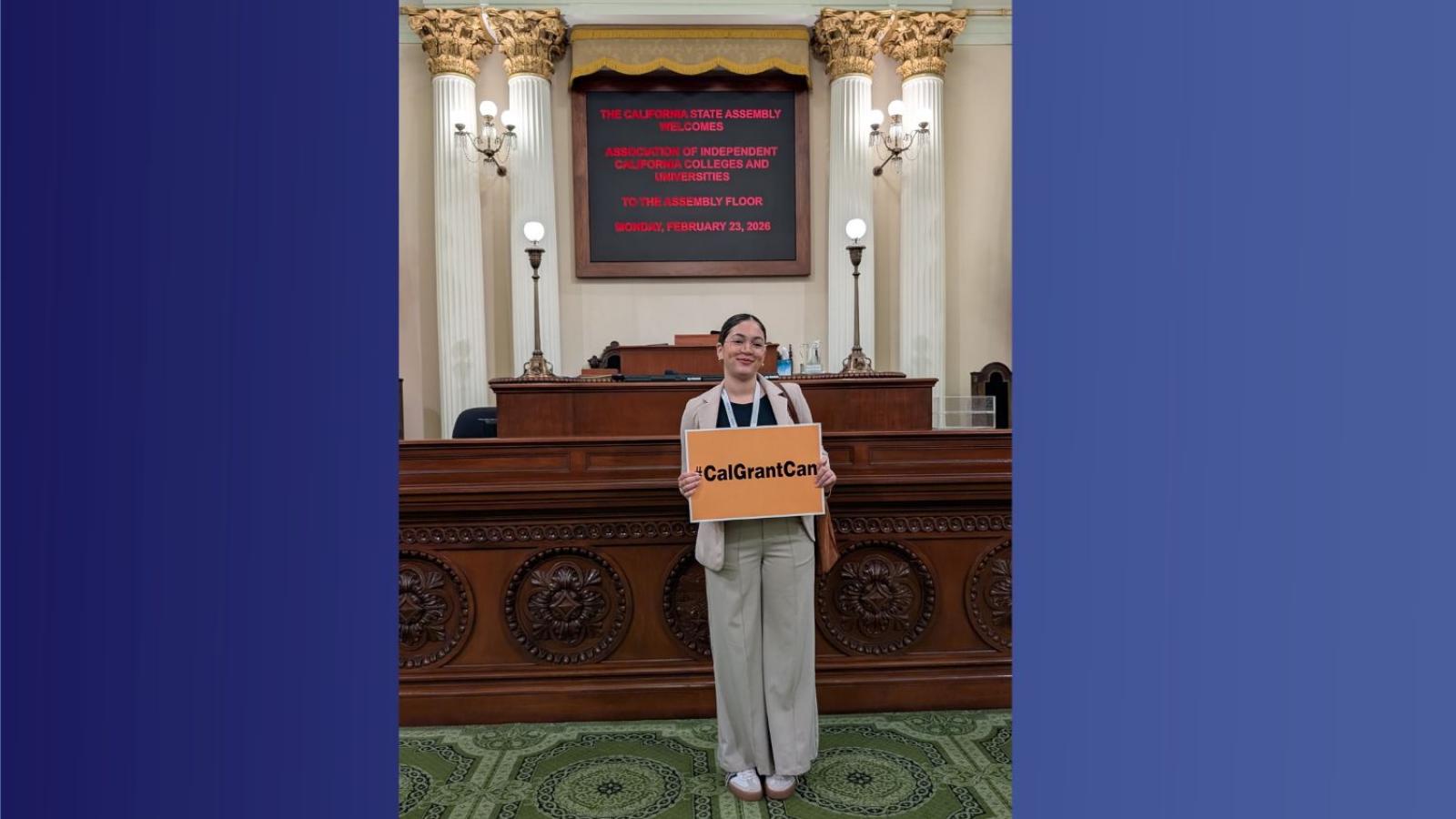 A student stands in the State Capitol building