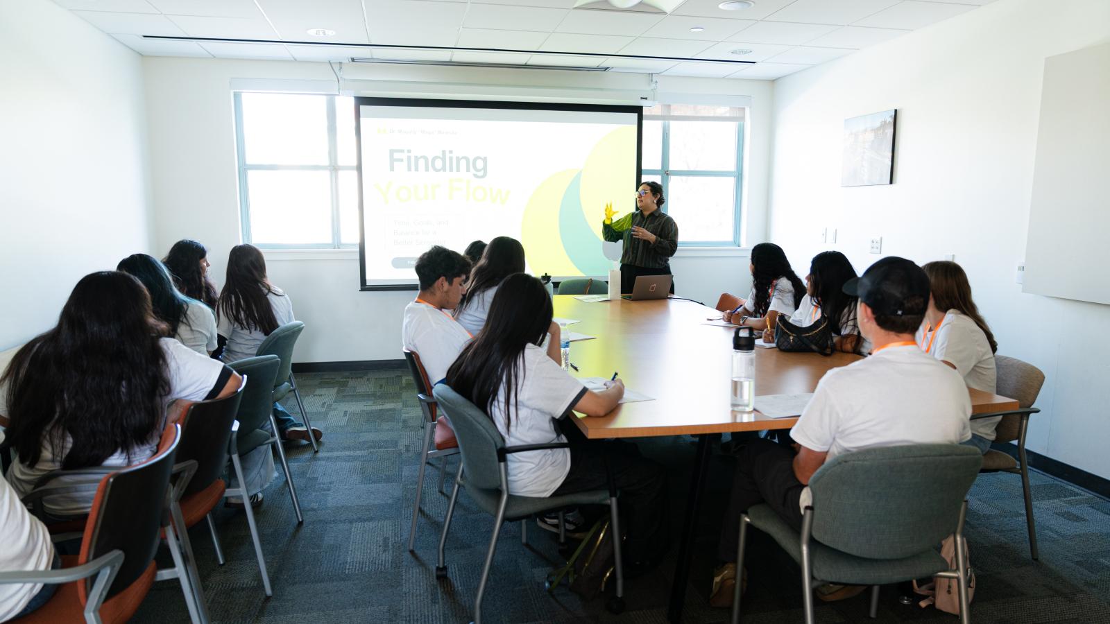 A teacher leads a lecture