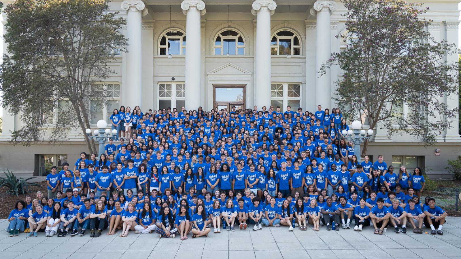 Hundreds of students stand for a photo