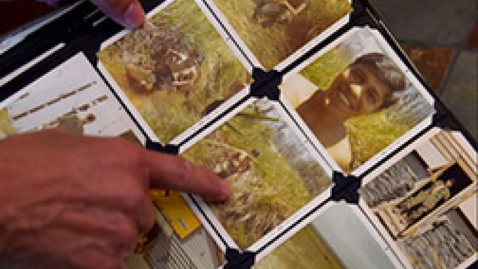 Professor Sandoval points to an image of his father in Vietnam