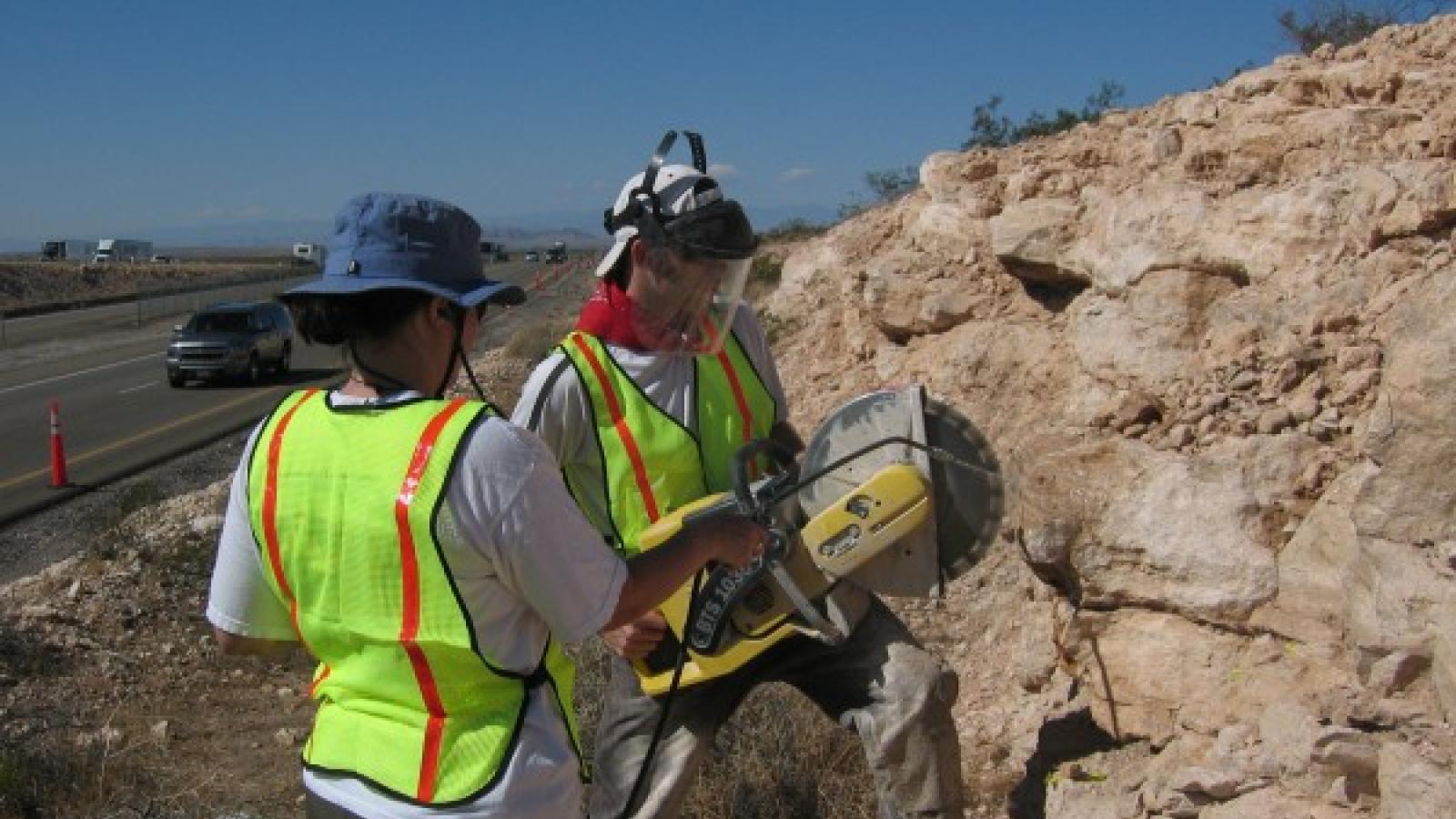 Students performing soil sampling