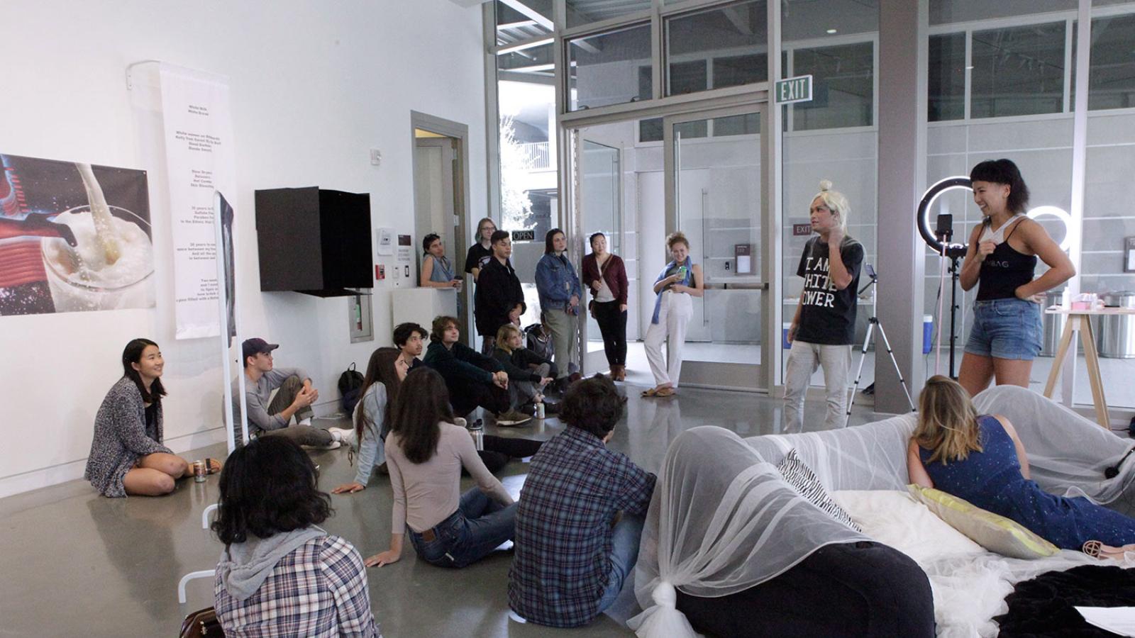 Kim Ye and Thinh Nguyen speaking with students