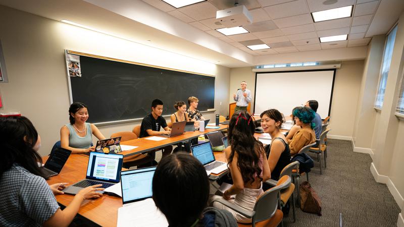 Peter Flueckiger, professor of Japanese, with his Japan as Utopia and Dystopia class in Mason Hall. 