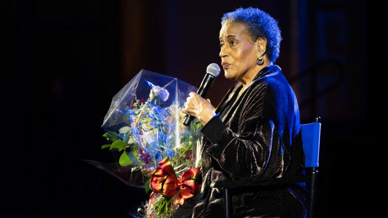 Civil rights pioneer Myrlie Evers-Williams ’68 addresses the crowd in Bridges Auditorium during the celebration of her 90th birthday.