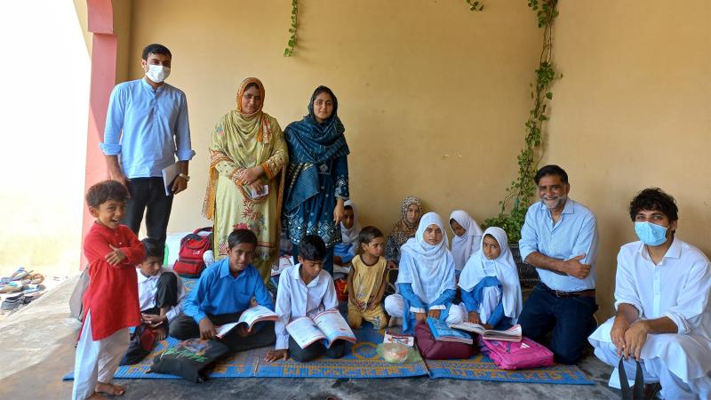 Group of school children and educators in Pakistan