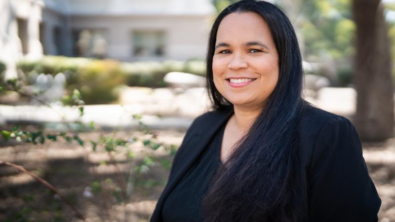 Professor Erica Dobbs outside on campus