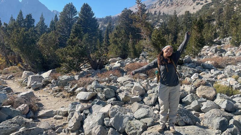 Isabel Ramos standing in a mountain environment