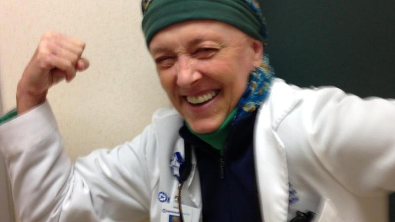 Dr. Pamela Sutton posing in front of her office