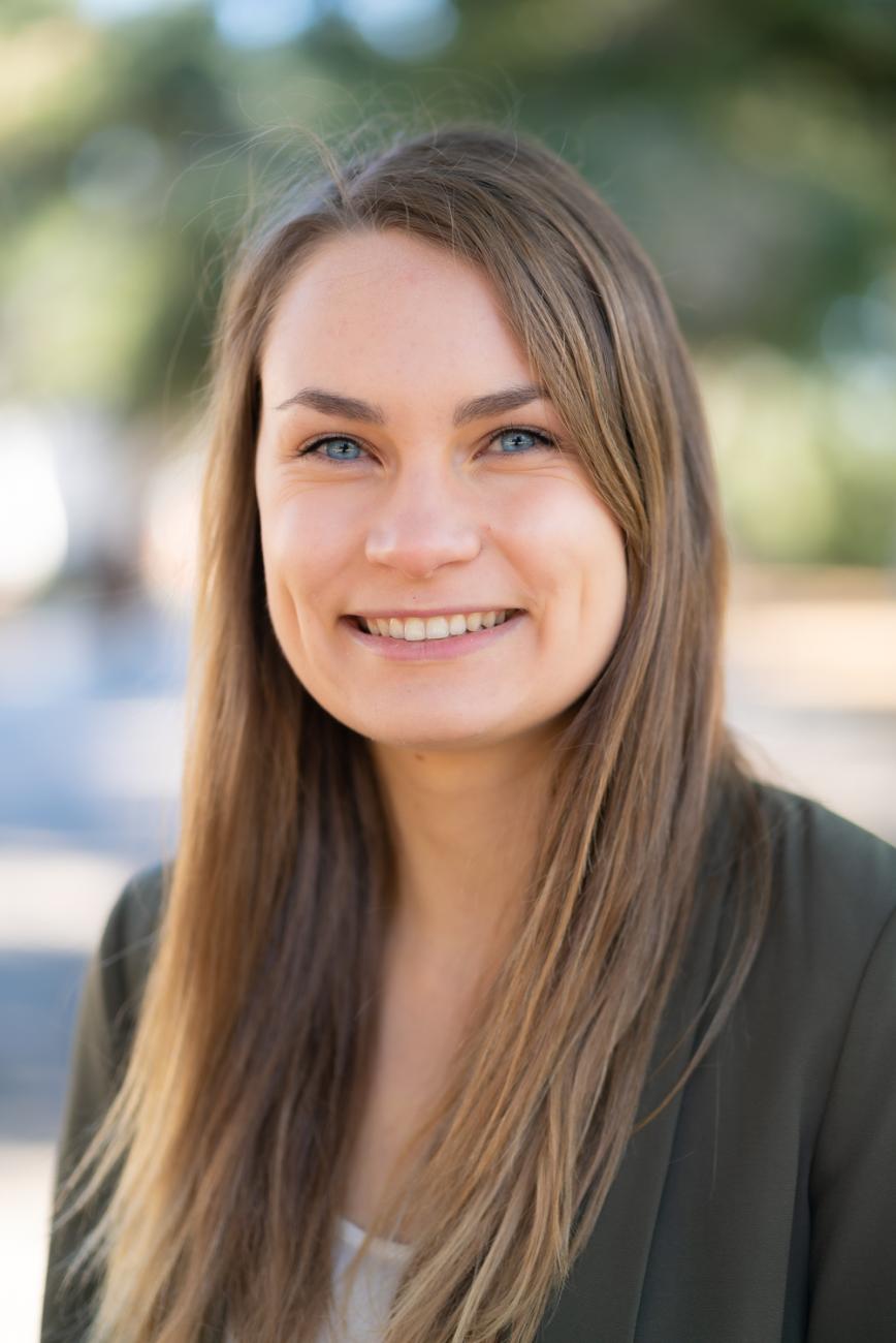 Headshot of Mira May.