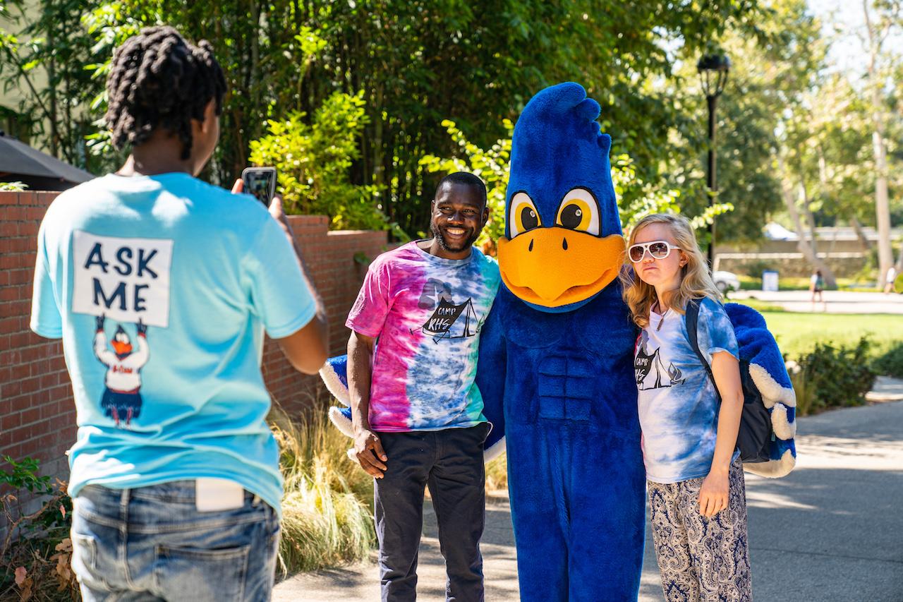Cecil Sagehen with student staff on Move In Day 2019