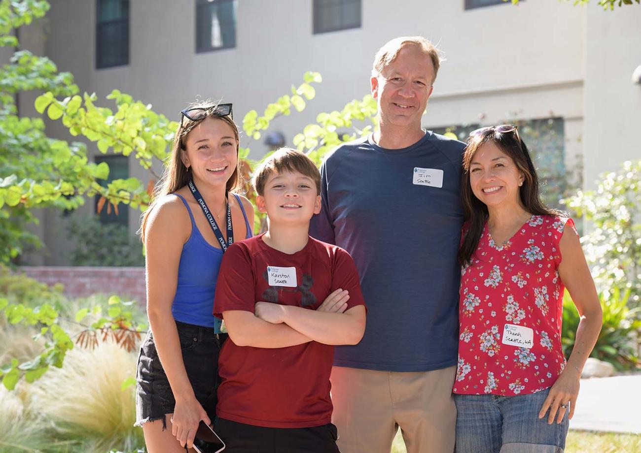 family poses during move in 2021