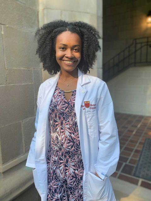 woman wearing white doctor coat