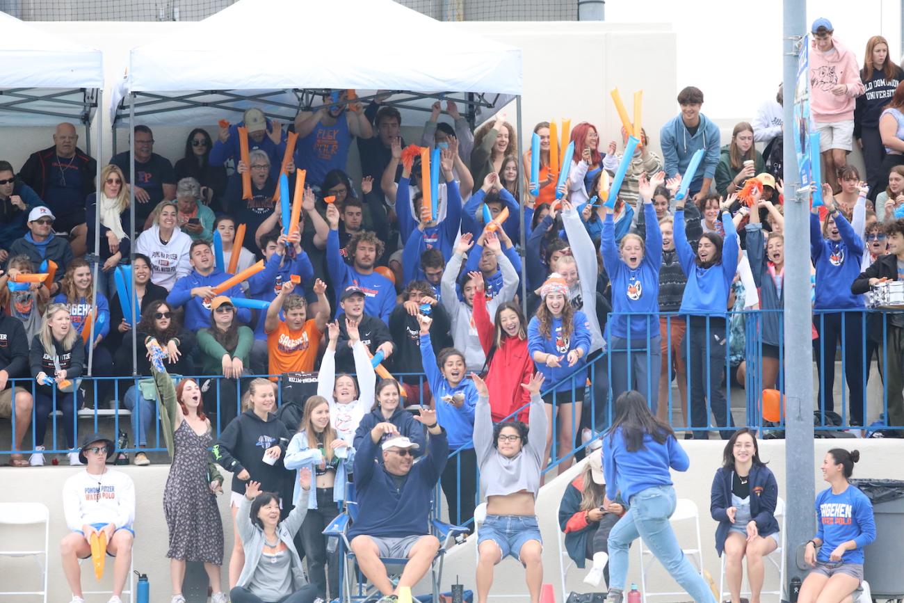 crowd celebrates during women's water polo
