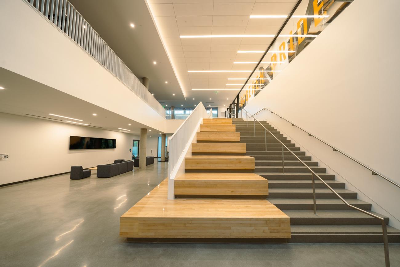 Stairway seating area leading to upstairs of Center for Athletics, Recreation and Wellness