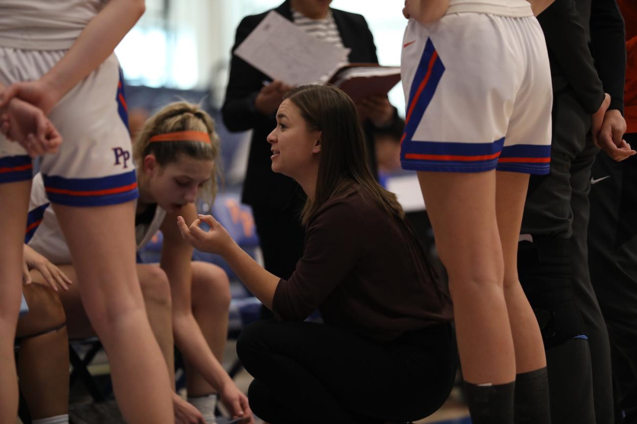 Current Sagehens Coach Alaina Woo '17 with players during game
