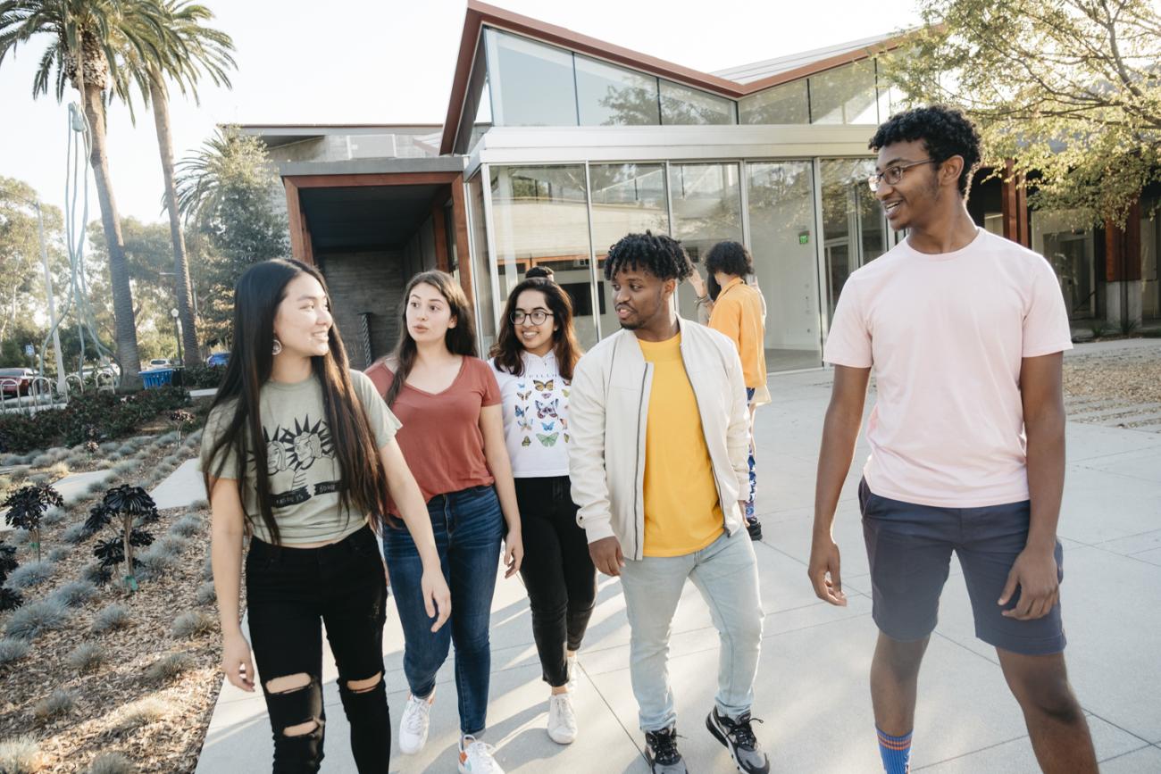 group of students walking outside Benton art museum