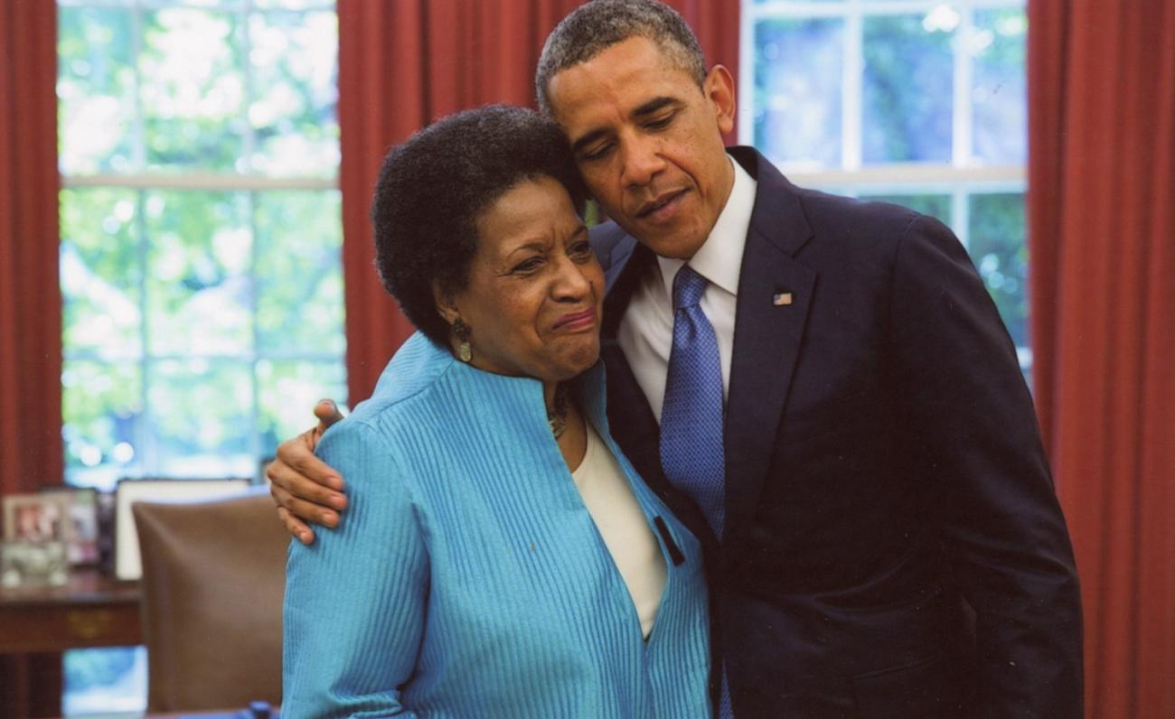 President Barack Obama embraces Myrlie Evers-Williams during her visit in the Oval Office, June 4, 2013. The President met with the Evers family to commemorate the approaching 50th anniversary of Medgar Evers' death. Photograph by Pete Souza, White House Photographs.