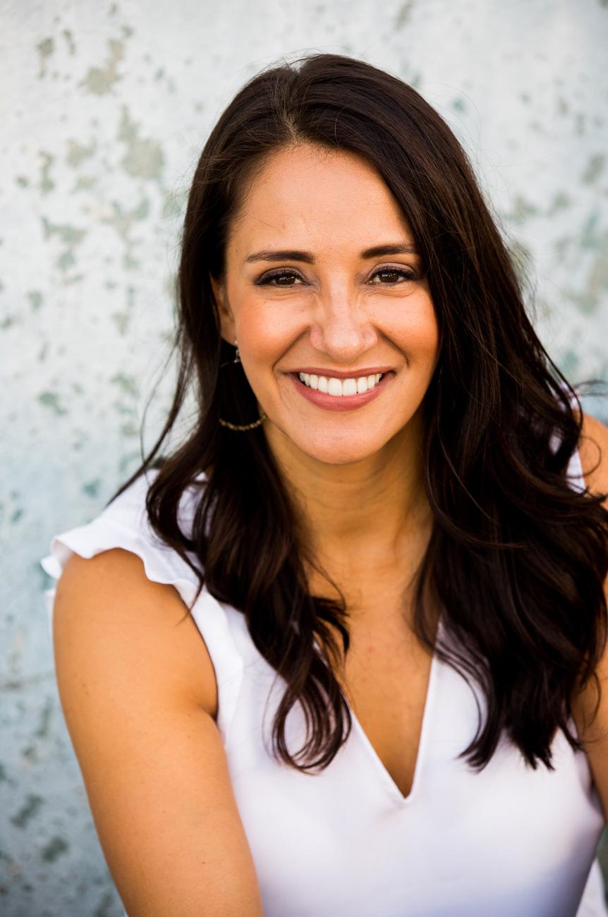 Head and shoulders photo of Sara Sadhwani wearing a white blouse