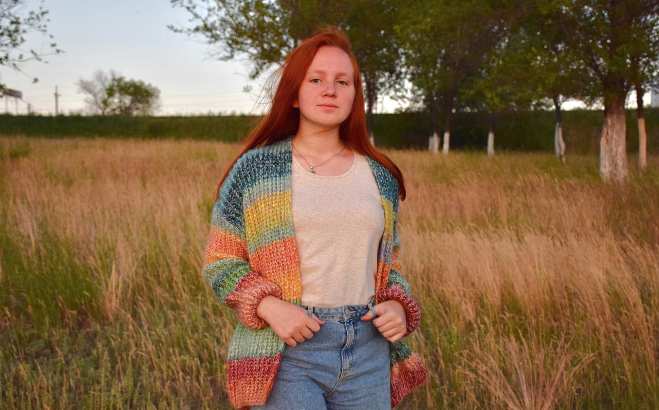 Russian Language Resident standing in a field