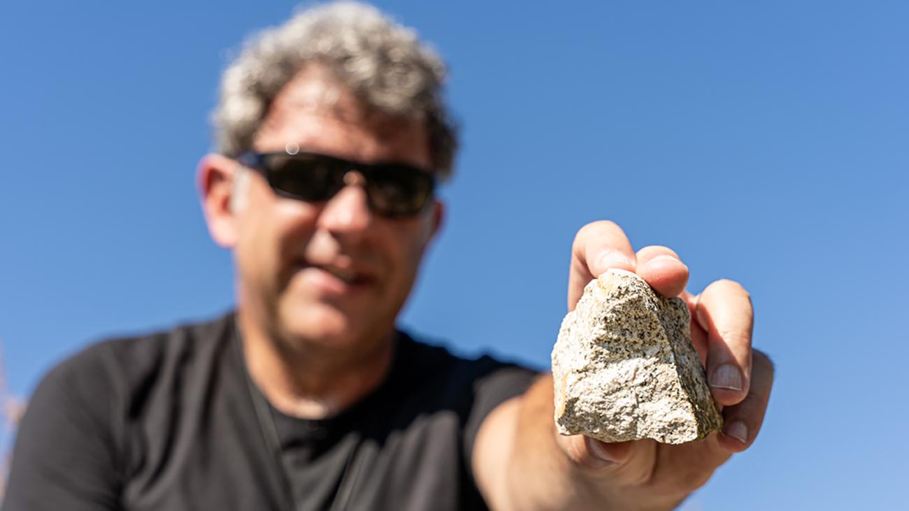 Jade Star Lackey displaying a rock