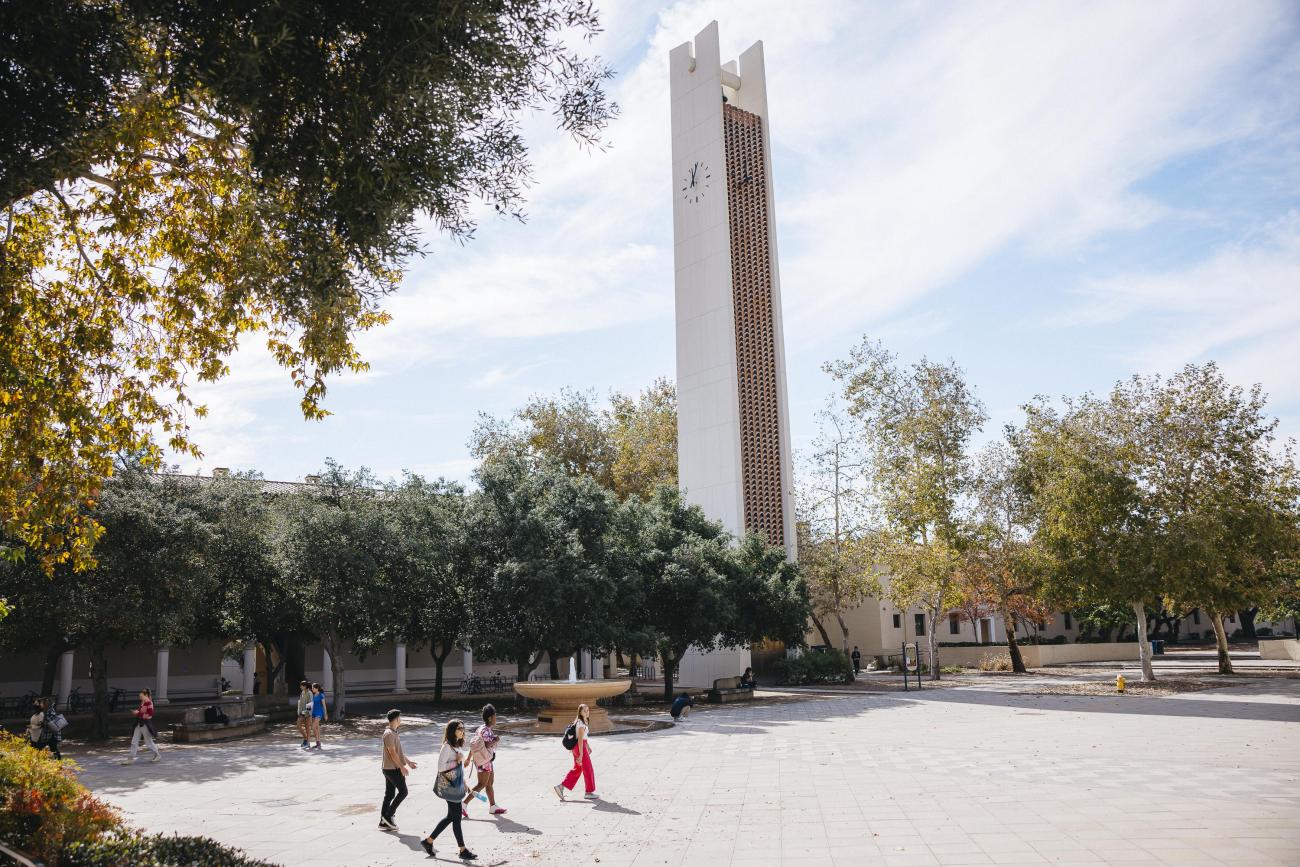 students walk on campus