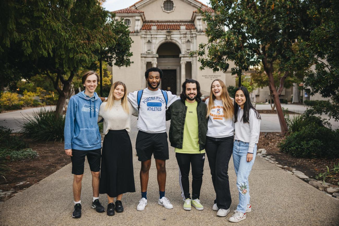 students stand together outside 