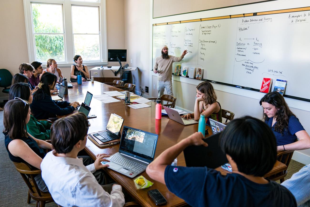 Professor teaches students in classroom.