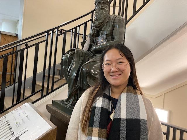 Angel Yuan in Paris by staircase