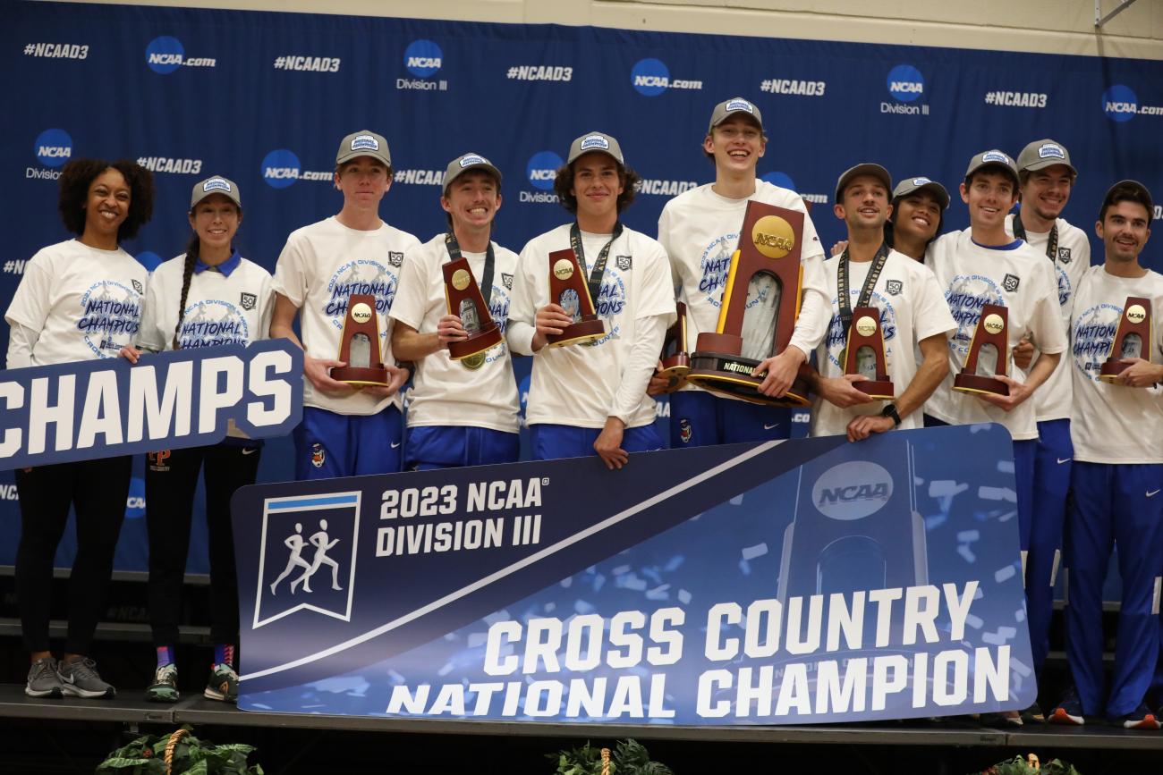 Sagehens celebrate with the championship trophy