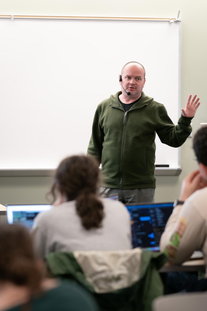 Mikey Dickerson '01 teaching a computer science class