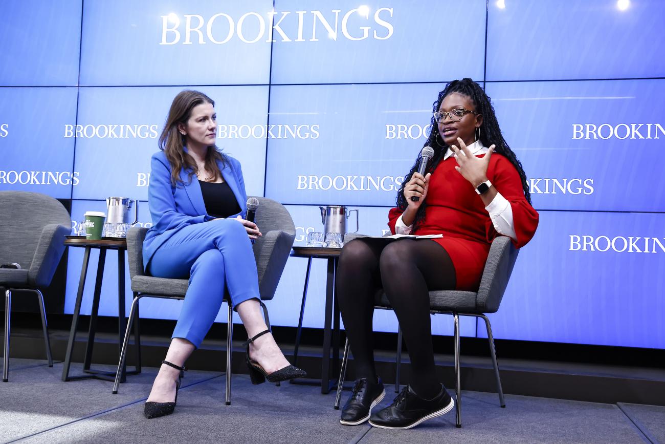Chinasa Okolo on stage giving a talk to an audience