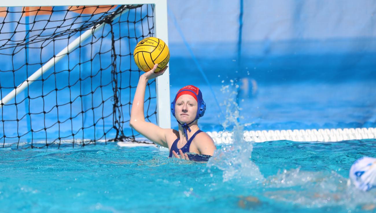 Zosia Amberger playing goalie in water polo