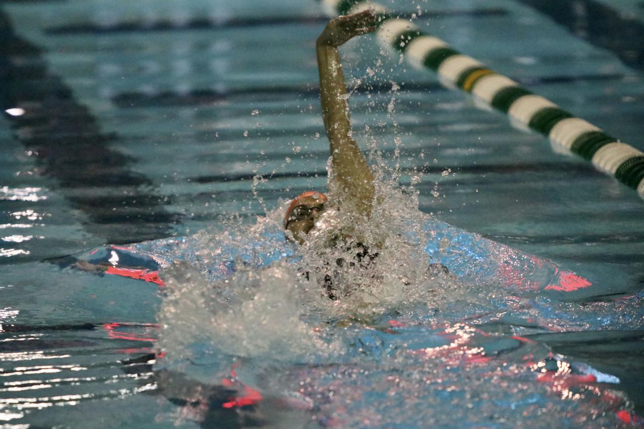 Tori Agostini doing a backstroke in the pool