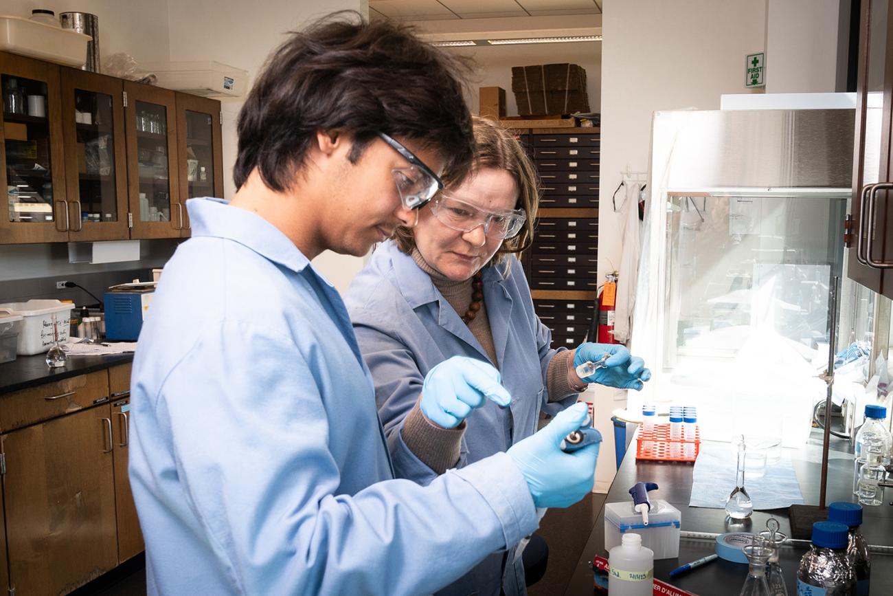 Professor and student in lab