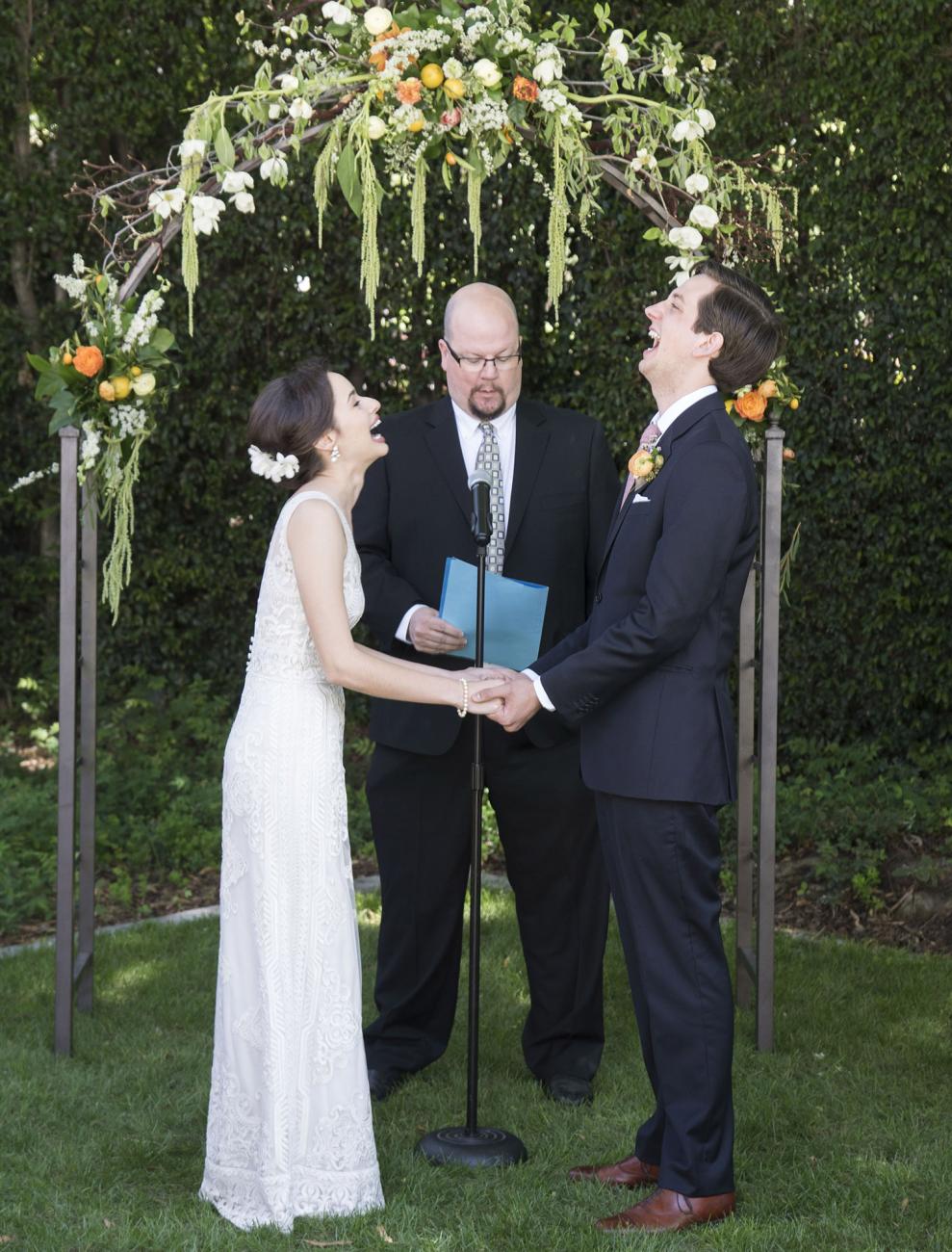Karl Johnson officiates at a wedding.