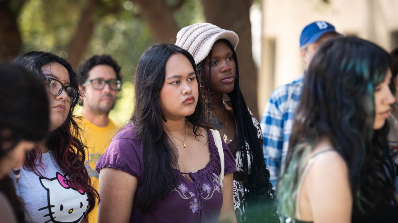 Exit 47 participants listen to a student tour guide