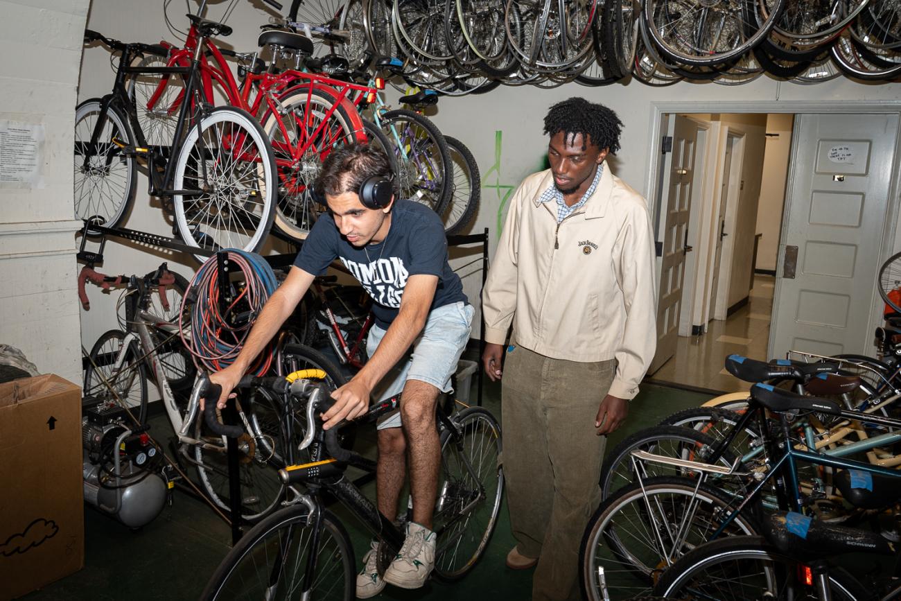 A young man tries out a bike