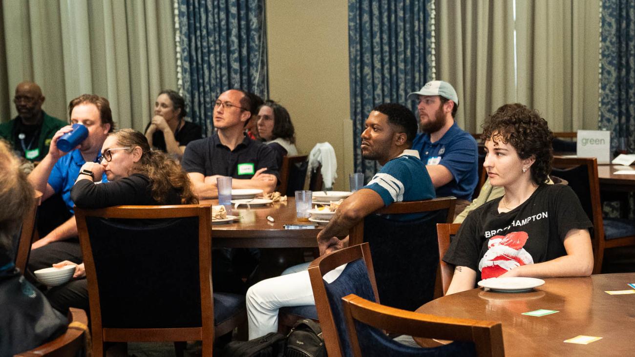 Faculty, staff, and students listen to Stephen Solomon's talk inside Frank Blue Room.