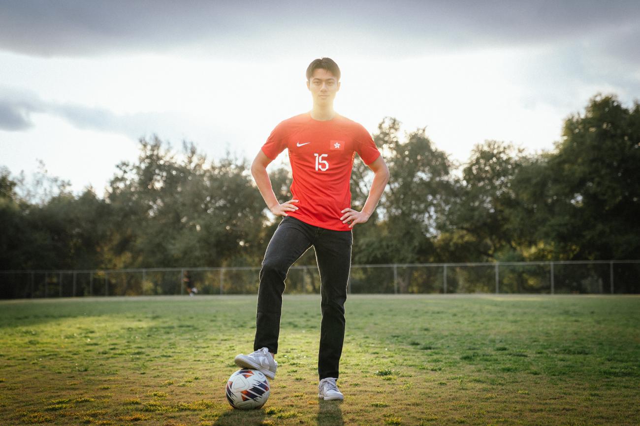 Kyle Lau and a soccer ball