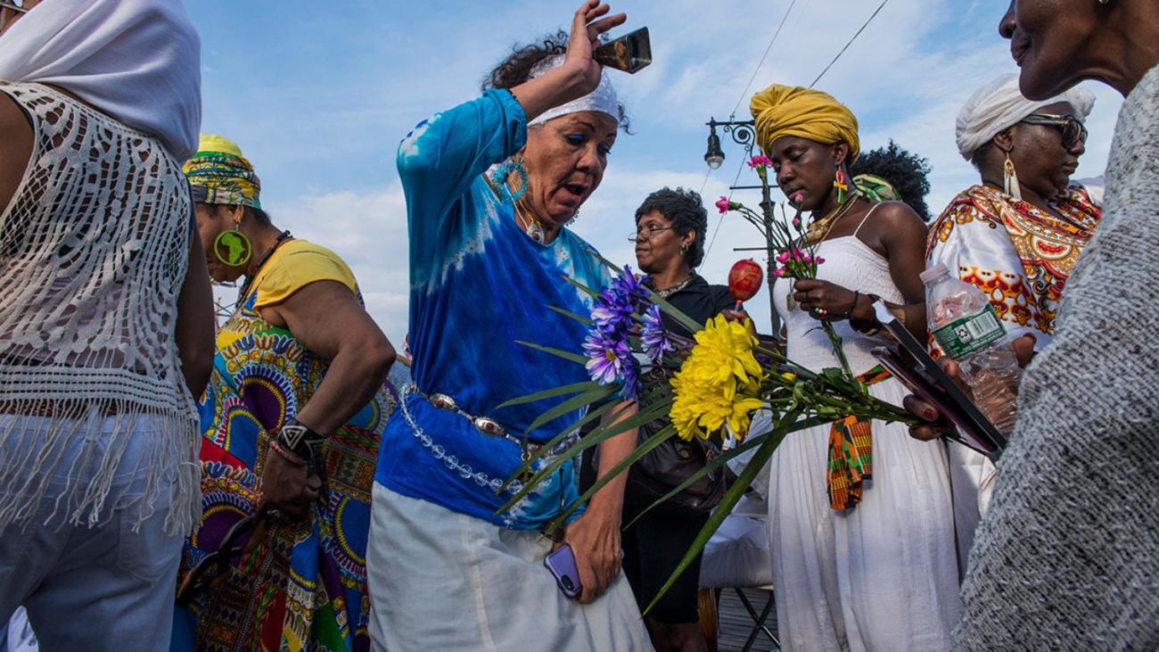 From the book: American/True Colors, Ceremonial dancers celebrating at The People  of the Sun Tribute to the Ancestors of the Middle Passage, Coney Island, Brooklyn, NY 2018  (Photograph)