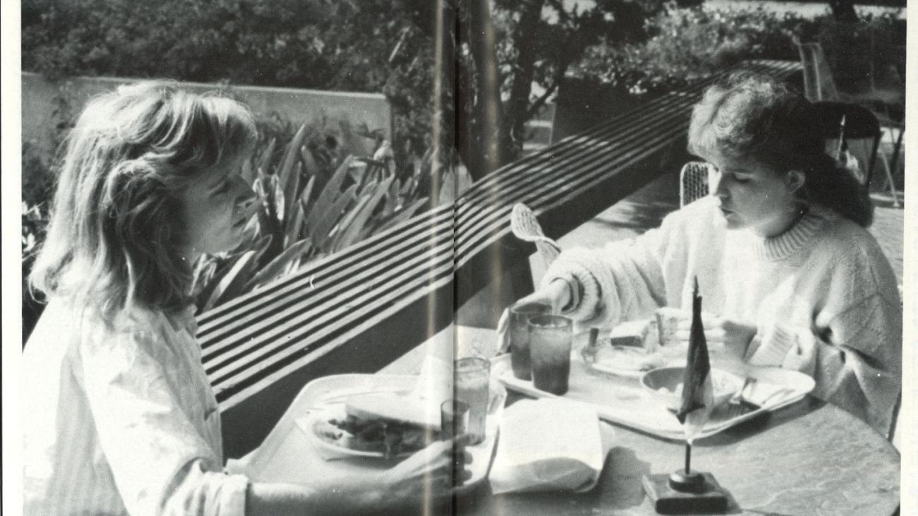 two students at the language tables