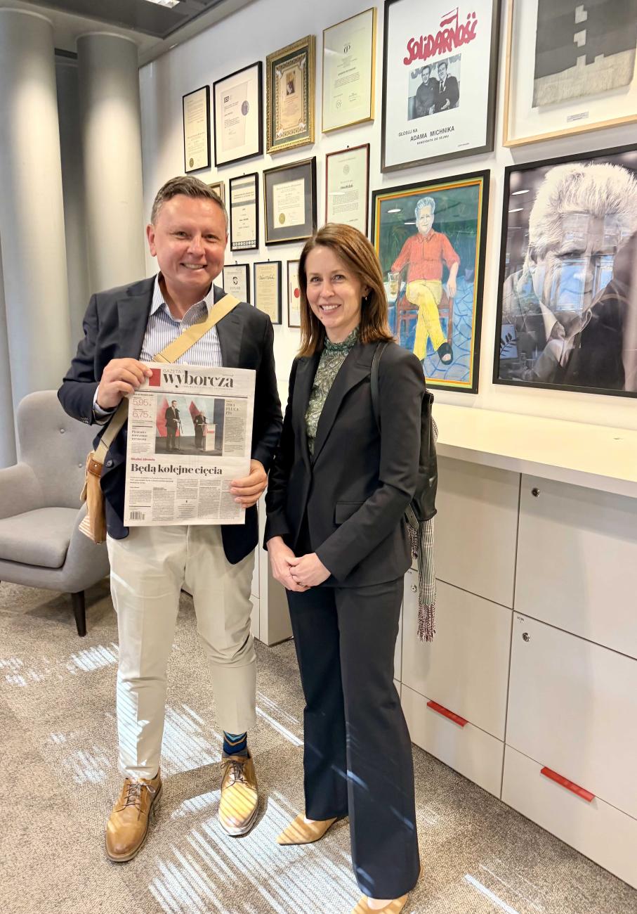 Mietek Boduszynski and Monica Chellam at newspaper in Warsaw. 