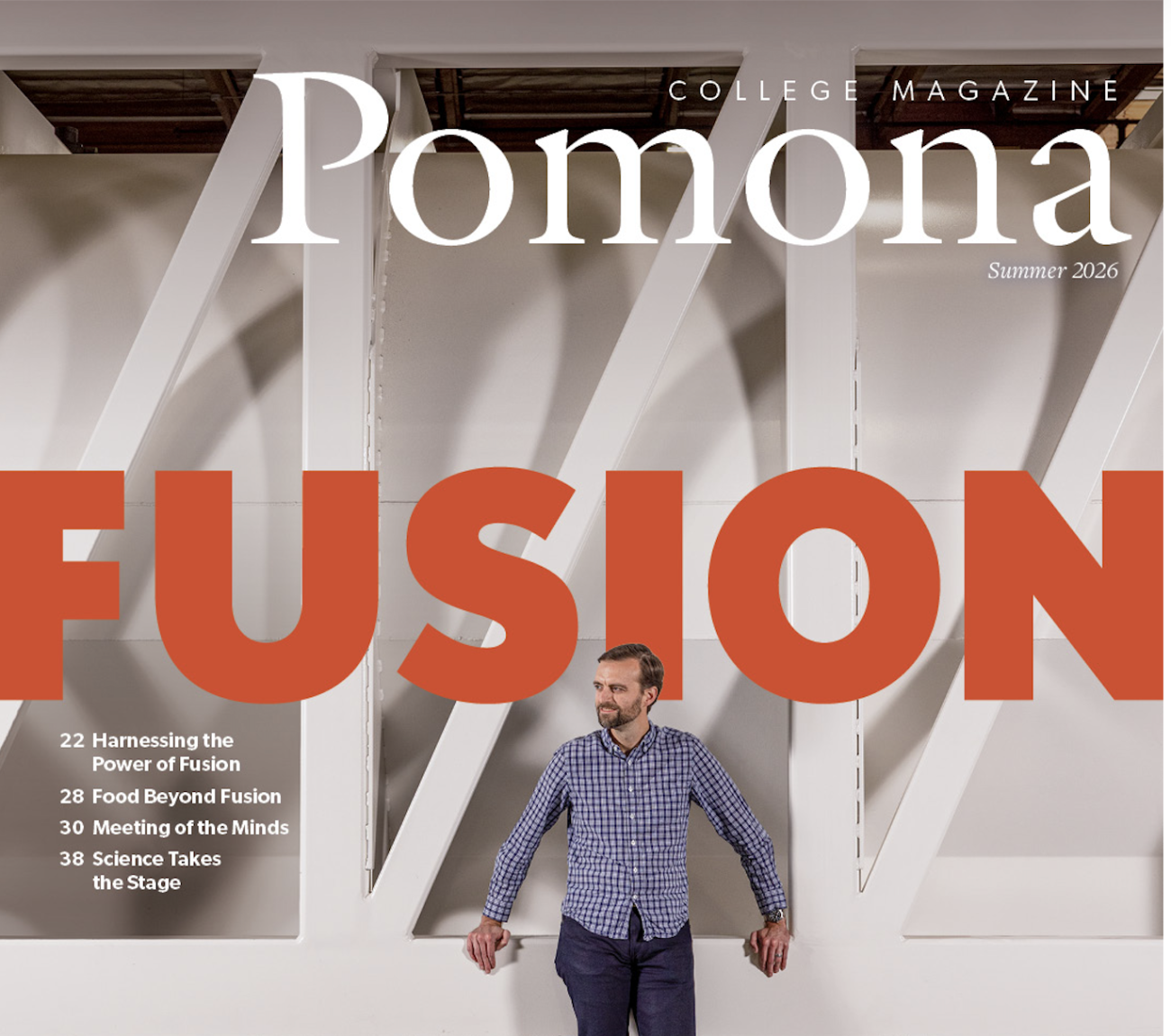 Magazine cover featuring man posing 